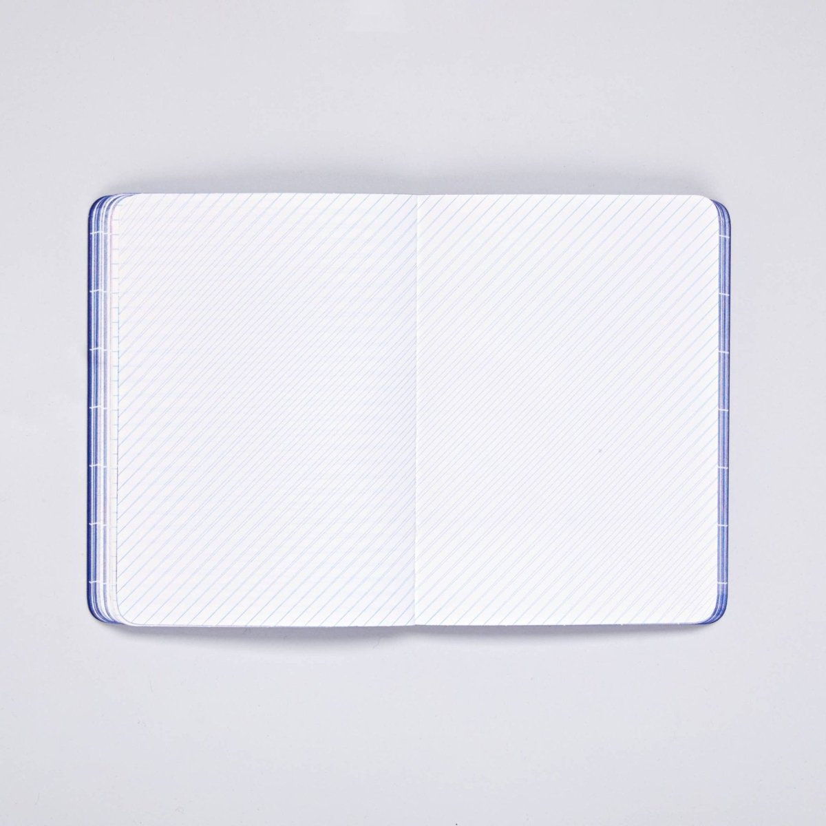 nuuna - BREAK THE GRID Notebook (A6+) Blau - ROSA ECK - Blau, Papier, S