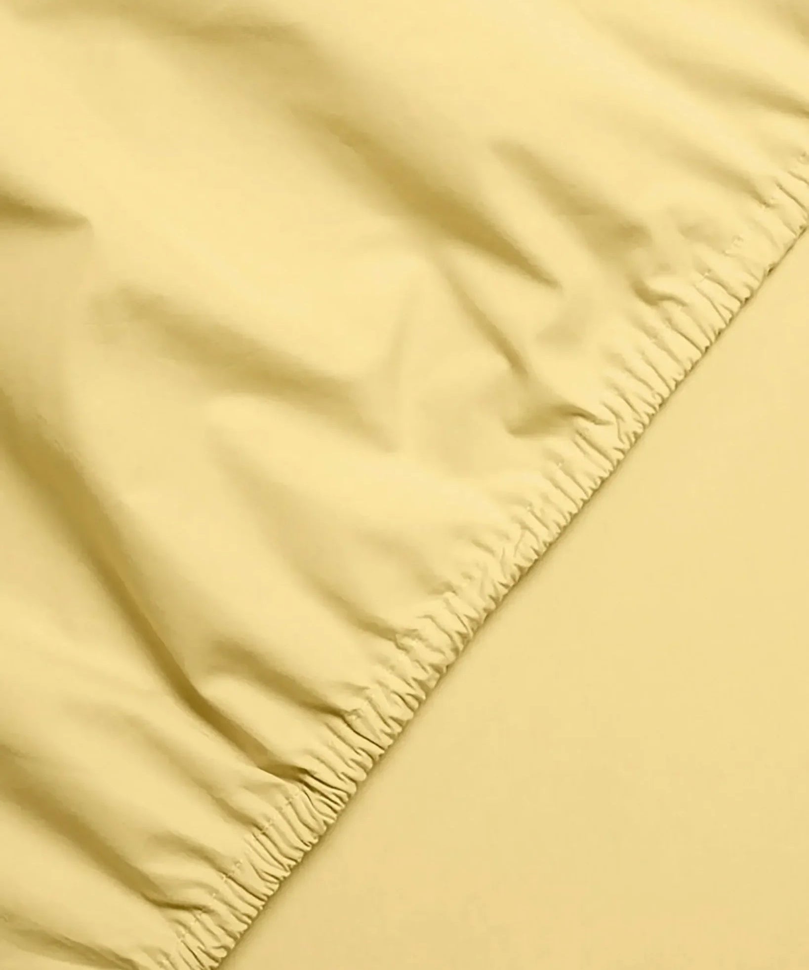 SUITE702 - Spannbettlaken aus Bio-Baumwolle • Butter Yellow - ROSA ECK
