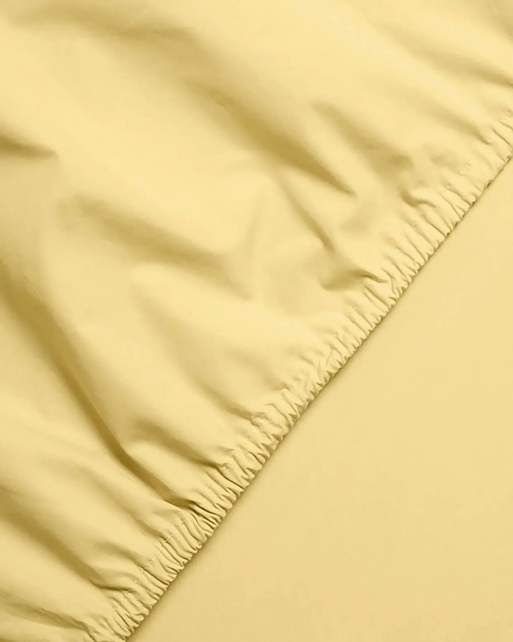 SUITE702 - Spannbettlaken aus Bio-Baumwolle • Butter Yellow - ROSA ECK