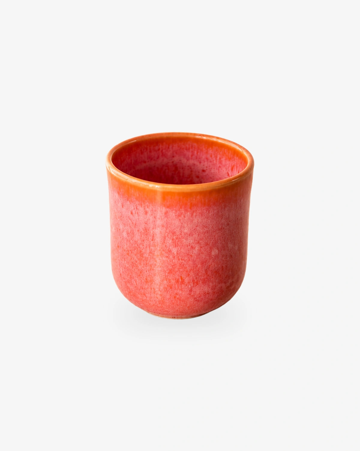 Schlanker Keramikbecher in kräftigem Orange, ohne Henkel