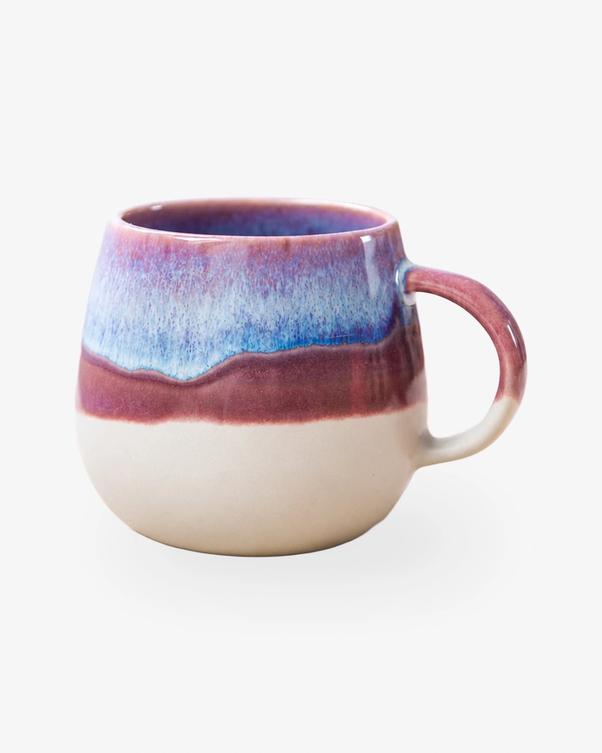 Große Kaffeetasse aus Steinzeug in Beige mit Lila und Blau