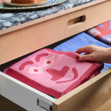 Wrap - FACES Geschirrtuch (50 × 70 cm) • Pink/Maroon - ROSA ECK